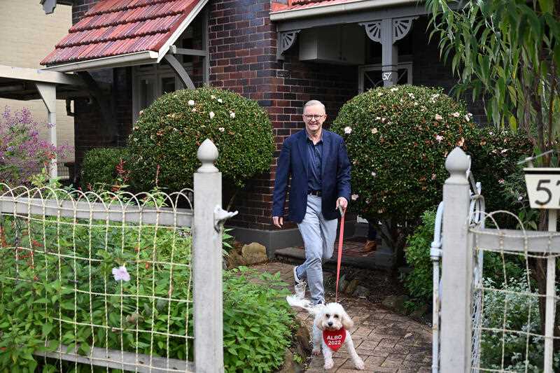 Incoming prime minister Anthony Albanese is seen leaving his house with his partner Jody Haydon and his dog Toto in Marrickville, Sydney, Sunday, May 22, 2022