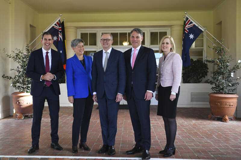 Australian Prime Minister Anthony Albanese poses for photographs with interim ministers Penny Wong, Jim Chalmers, Richard Marles and Katy Gallagher after a swearing-in ceremony at Government House in Canberra, Monday, May 23, 2022