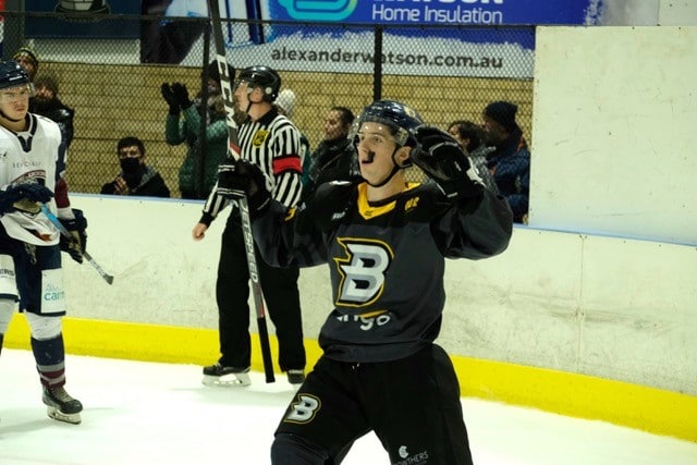 Canberra Brave ice hockey player reacts after scoring a goal