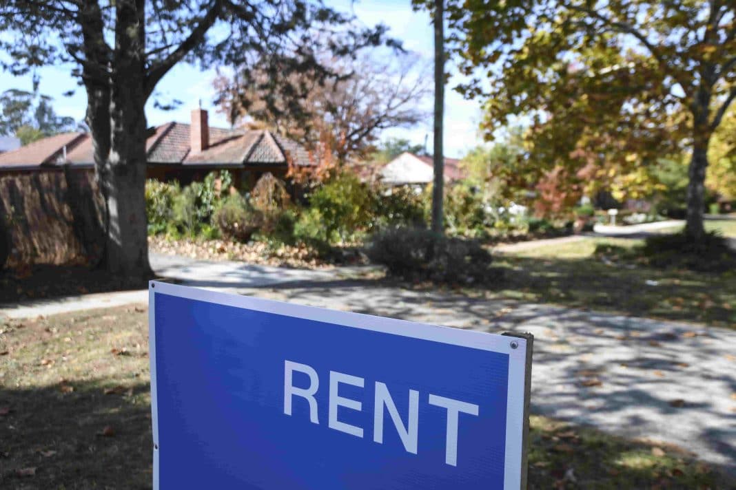 A 'for rent' sign is seen outside a house in Canberra