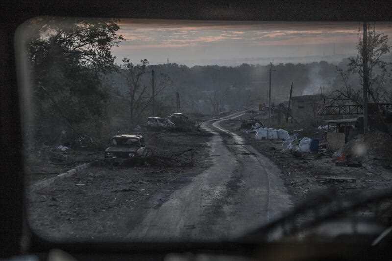 The gutted remains of cars lie along a road during heavy fighting at the front line in Severodonetsk, Luhansk region, Ukraine, Wednesday, June 8, 2022