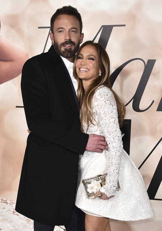 Film stars Jennifer Lopez, right, and Ben Affleck attend a photo call for a special screening of 