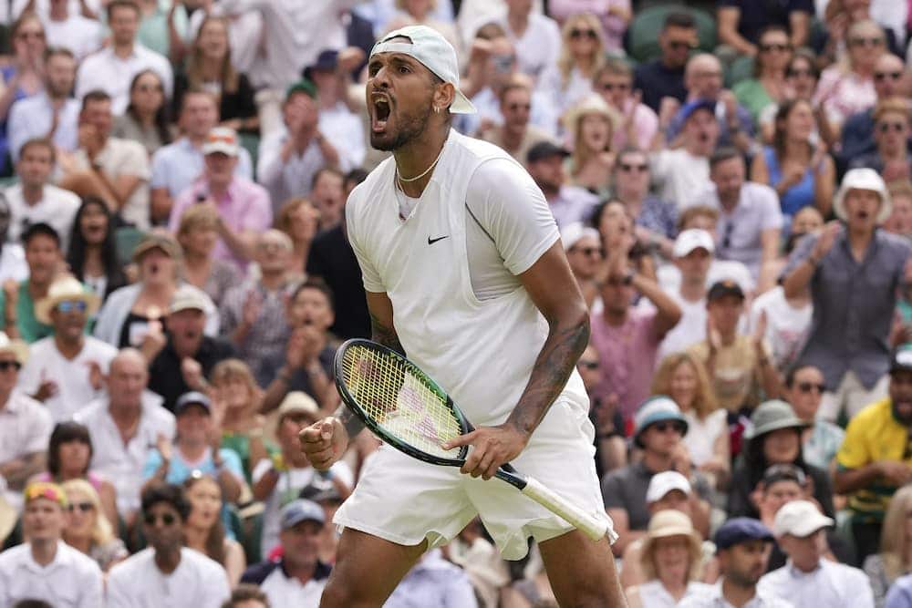 Nick Kyrgios has produced a courageous display to make it into the quarter-finals at Wimbledon. (AP PHOTO)