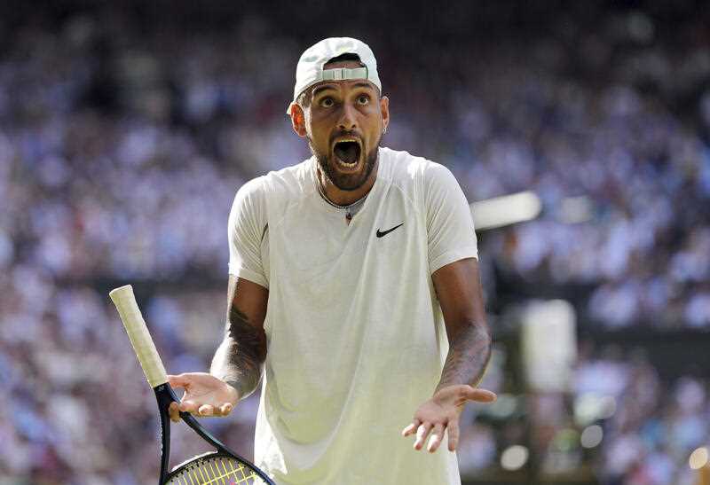 Australia's Nick Kyrgios reacts as he plays Serbia's Novak Djokovic in the final of the men’s singles on day fourteen of the Wimbledon tennis championships in London, Sunday, July 10, 2022