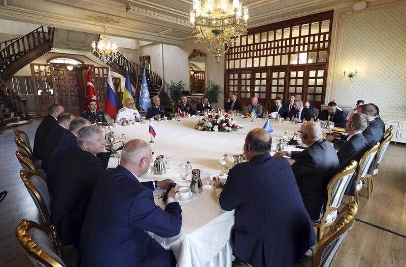 Russian, left, and Ukranian, top right, delegations meet along with United Nation observers, right, and Turkish Defence Ministry members in Istanbul, Turkey, Wednesday, July 13, 2022