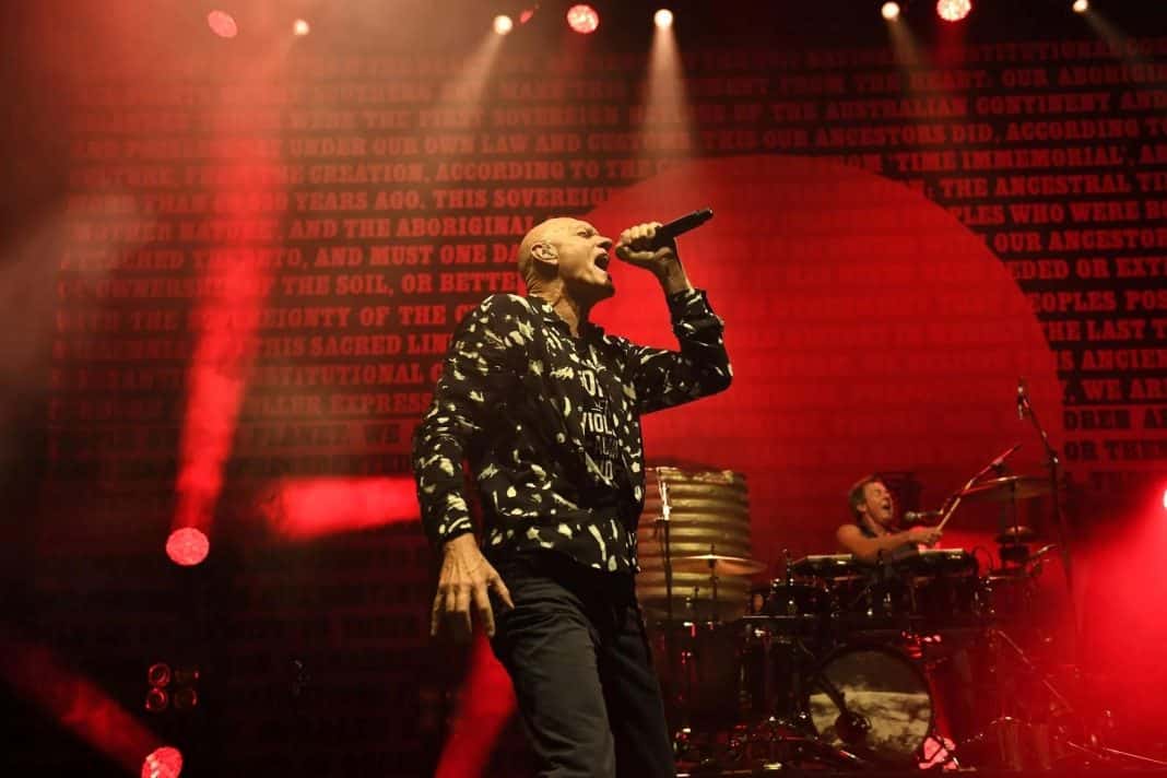 Midnight Oil lead singer Peter Garrett performing on stage