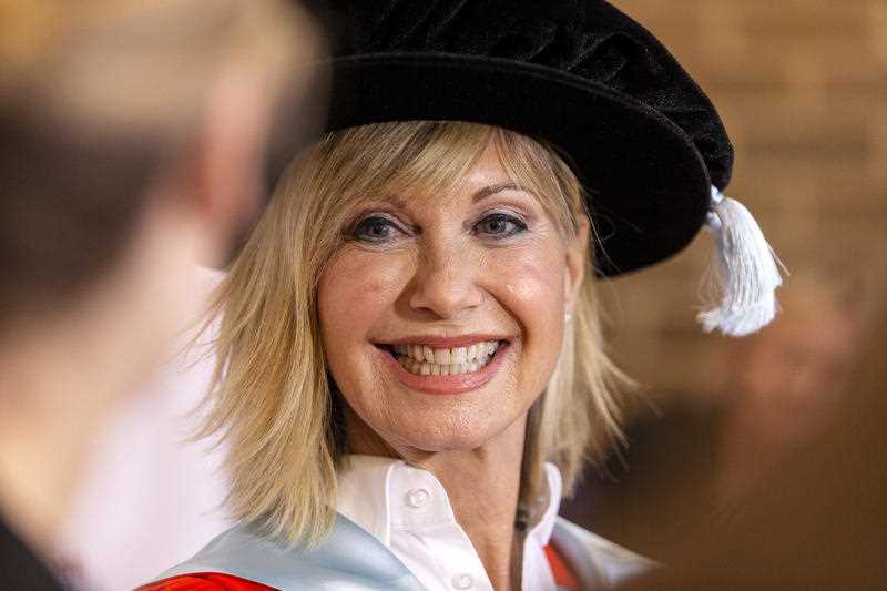 Olivia Newton-John talks to the media ahead of receiving an Honorary Doctorate of Letters at a special graduation ceremony at La Trobe University, Union Hall, Melbourne, Monday, May 14, 2018