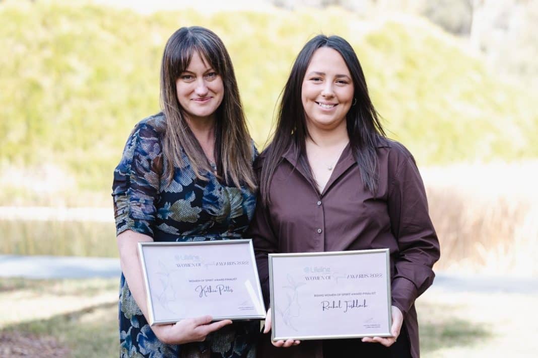 Two women holding Lifeline Canberra Women of Spirit award certificates