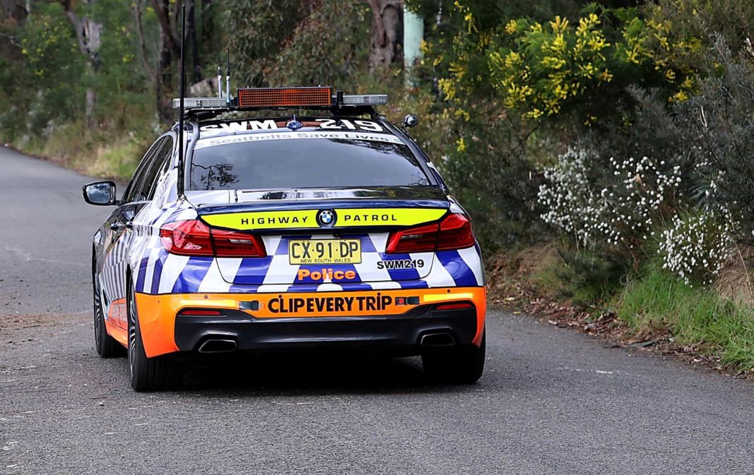 NSW Highway Patrol car in the countryside