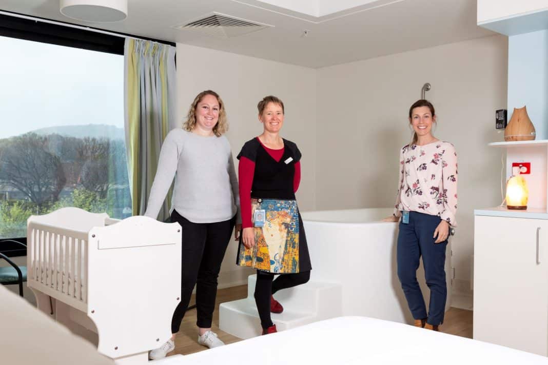 three women standing in well-appointed Canberra birth centre birthing suite