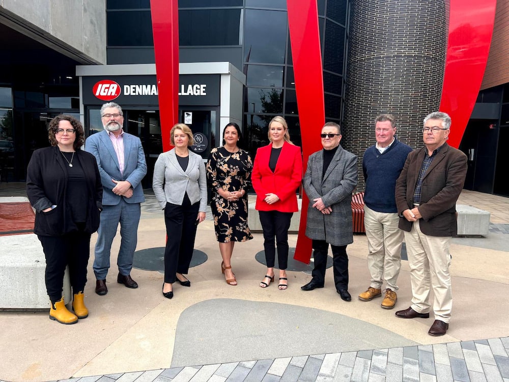 Dr Marisa Paterson (centre, in red) launched her 'Keep Molonglo Pokie-Free' campaign this morning, supported by gambling advocacy and clubs representatives. Photo supplied